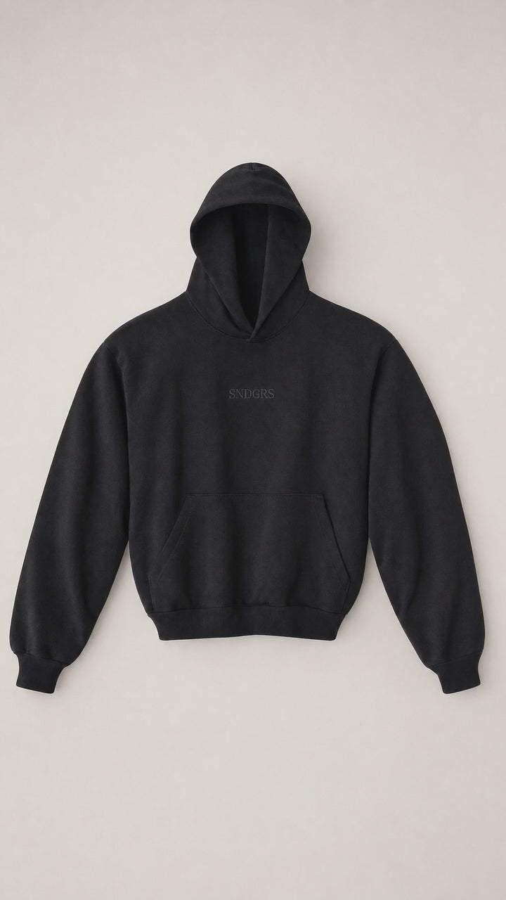 STILL. Volume 001 black heavyweight pullover rotating through front, side, and back views.